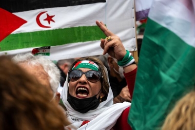 A woman protests in front of Spain&#039;s Ministry of Foreign Affairs on March 26, 2022, over the Spanish government&#039;s support for Morocco&#039;s autonomy plan for Western Sahara. 