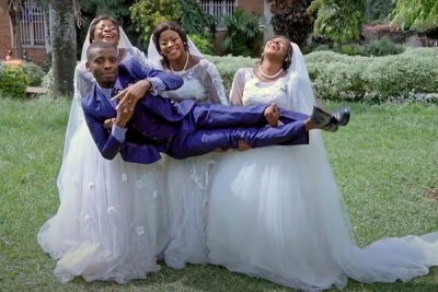  Tonton Luwizo and the triplets he married.