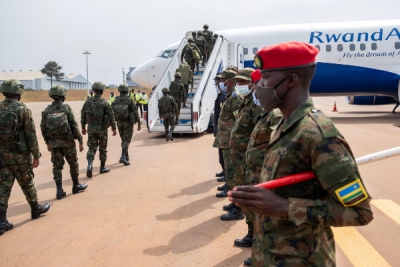 Rwandan military troops depart for Mozambique to help the country combat an escalating Islamic State-linked insurgency that threatens its stability, at the Kigali International Airport in Kigali, Rwanda, July 10. Alamy